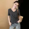 A new style of white, stylish, short-sleeved, off-the-shoulder T-shirt for women, a slimming, waist-hugging, irregular top A11514 Application Scenario